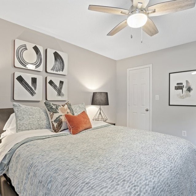 Andover At Crabtree Apartments - Spacious Bedroom With Carpet Flooring And Large Window