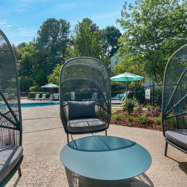 Andover at Crabtree Apartments - lounge area near pool