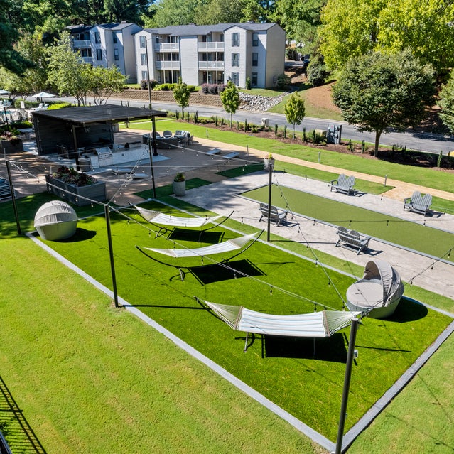 Andover at Crabtree - Outdoor seating area with hammocks