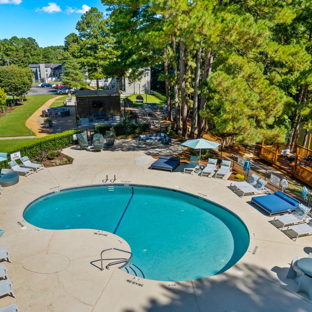 Andover at Crabtree - Pool area with chaise seating