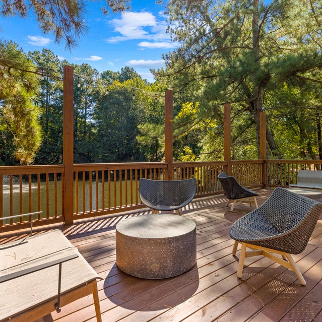 Andover at Crabtree - Seating area on deck overlooking lake and fountain